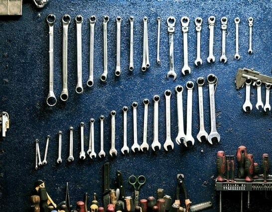 birds eye view of tools on a table top to represent tools used in SEO and digital marketing